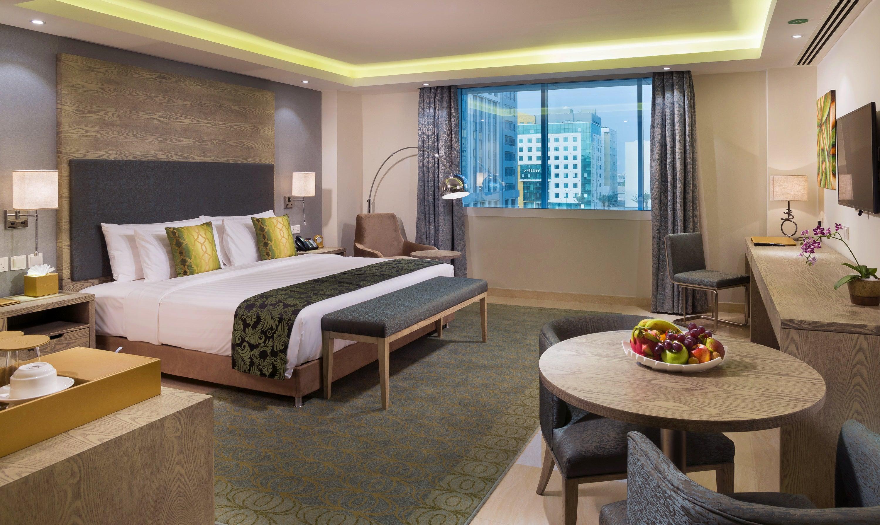 Ruime hotelkamer in Muscat met zithoek
